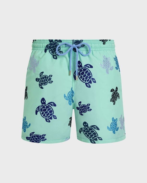 Green swim shorts featuring embroidered blue and turquoise turtles, with a drawstring waist and a lightweight material, size XL, from Vilebrequin's limited edition collection.