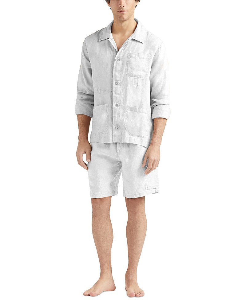 Light gray linen overshirt with a button-up front, long sleeves rolled to the elbows, and a chest pocket, paired with matching shorts for a casual summer look.