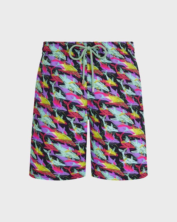 Blue swim shorts featuring a vibrant whale print in pink, yellow, and green, made from stretchy material with an elastic waistband and drawstring, size S.