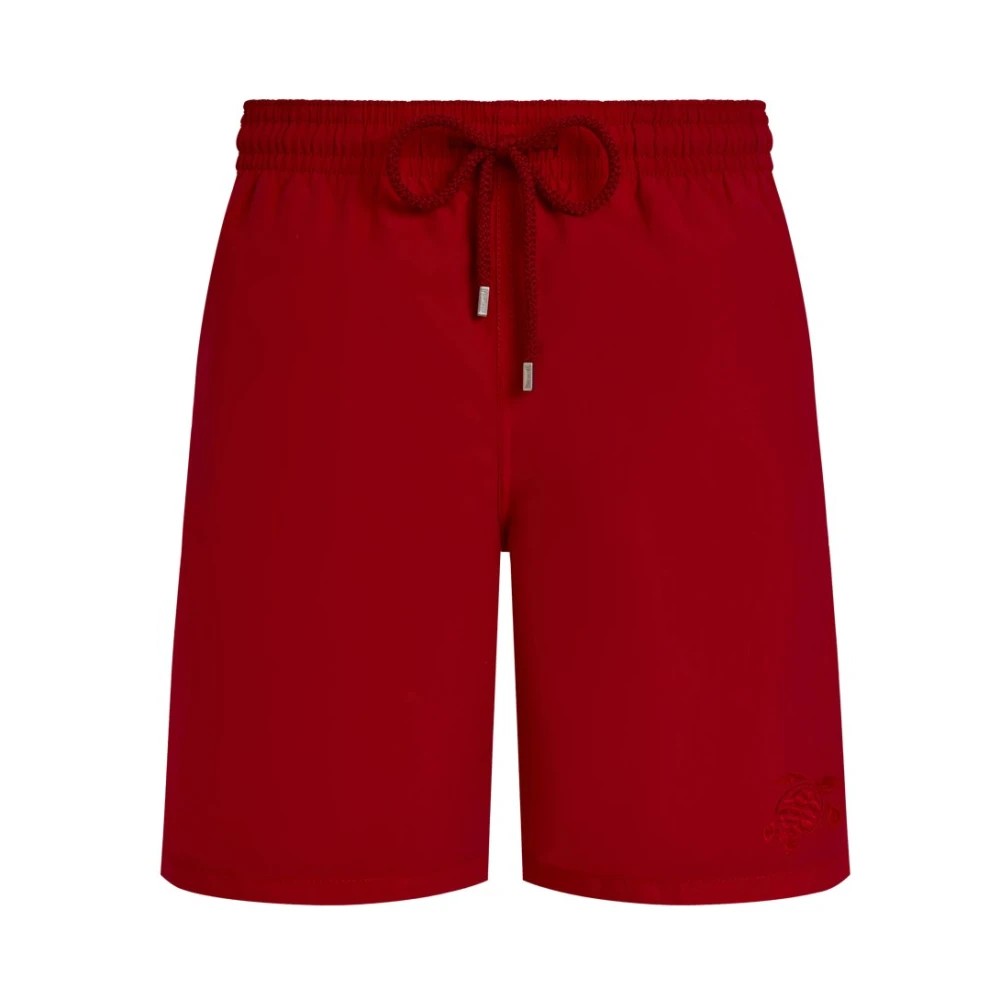 Red water-reactive long swim shorts by Vilebrequin, featuring an elastic waistband with drawstring and a subtle turtle logo on the lower left side, made from lightweight material.