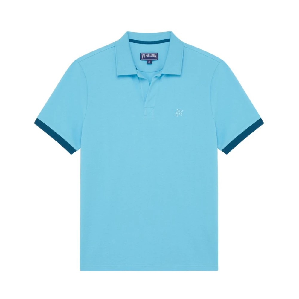 Light blue organic cotton pique polo shirt with a classic collar, short sleeves, and navy blue trim, featuring a small embroidered logo on the chest, available in size XXXL.