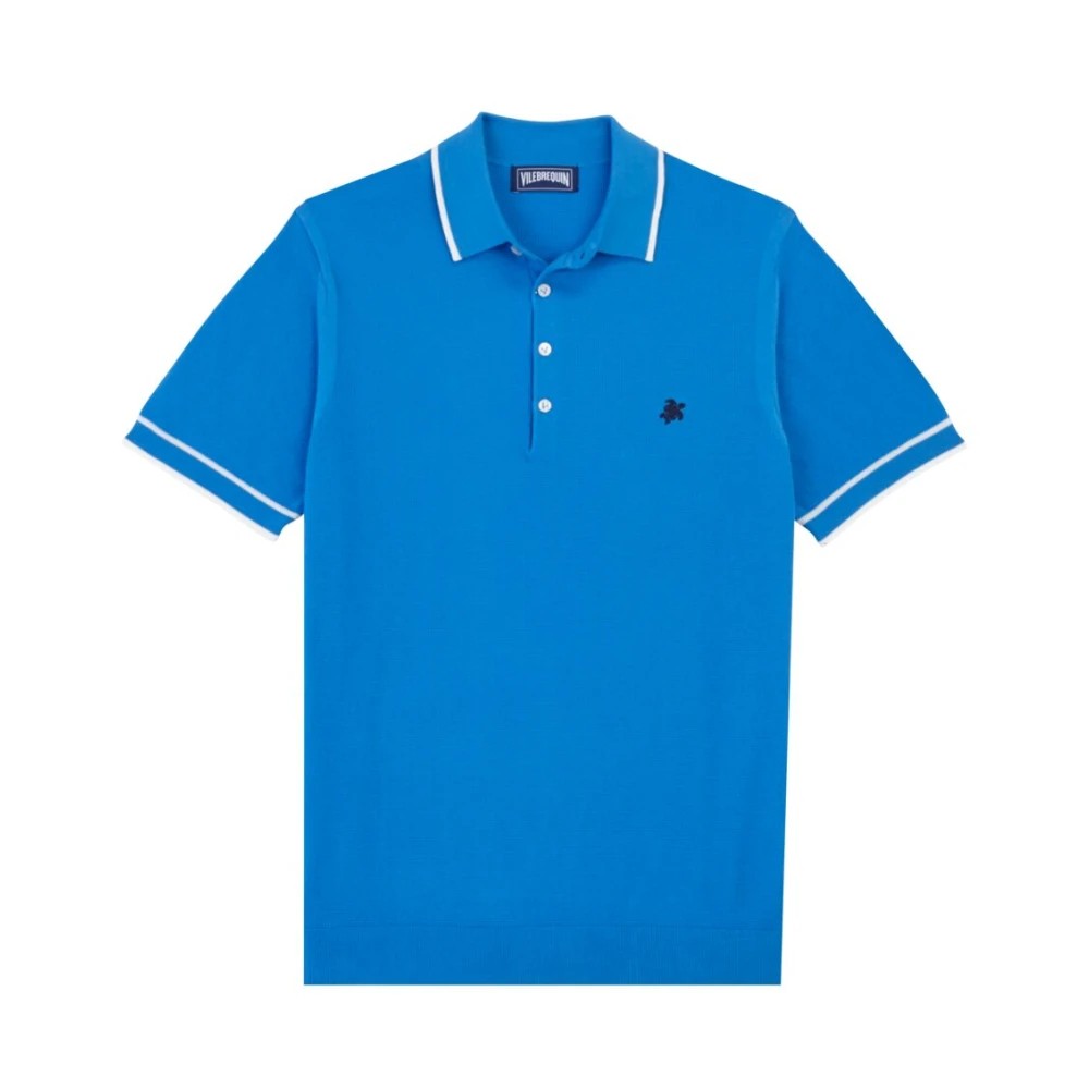 Solid blue organic knit cotton polo shirt with short sleeves, featuring a classic collar, three-button placket, and contrasting white trim on the collar and sleeves. Size M.
