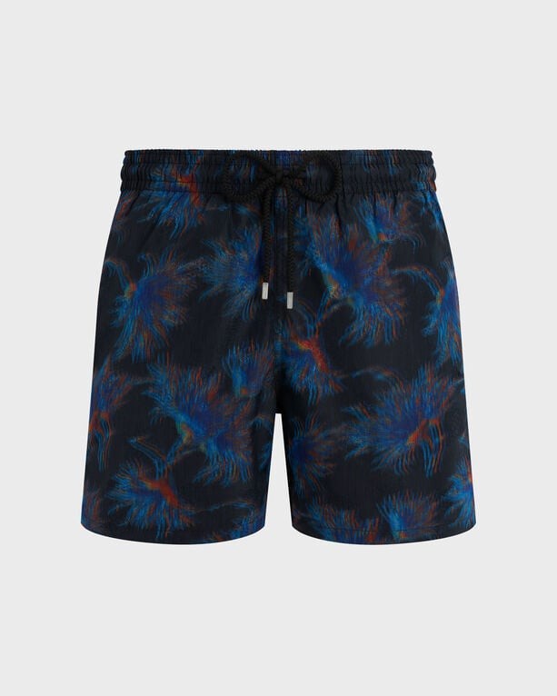 Black swim shorts featuring a vibrant blue and red abstract floral print, with an elastic waistband and drawstring for adjustable fit.