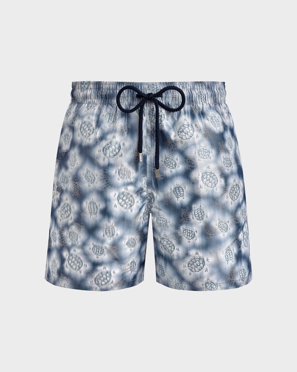 Blue silk swim shorts featuring a turtle print, elastic waistband with a drawstring, and a relaxed fit, designed in collaboration with Maison Bucol, available in size XXXL.