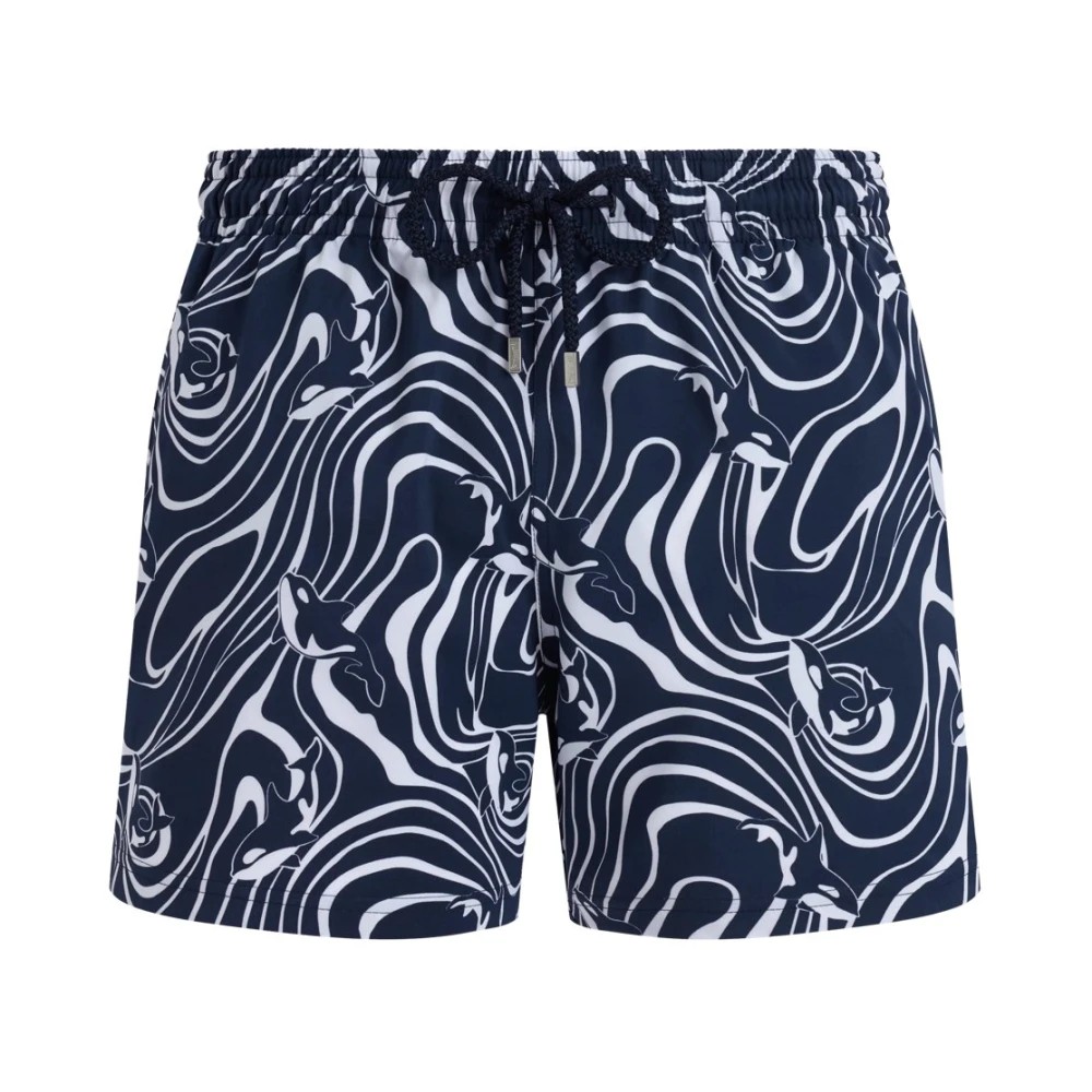 Navy swim trunks featuring a white swirling pattern with orca motifs, made from stretch material, designed with an elastic waistband and drawstring for comfort.