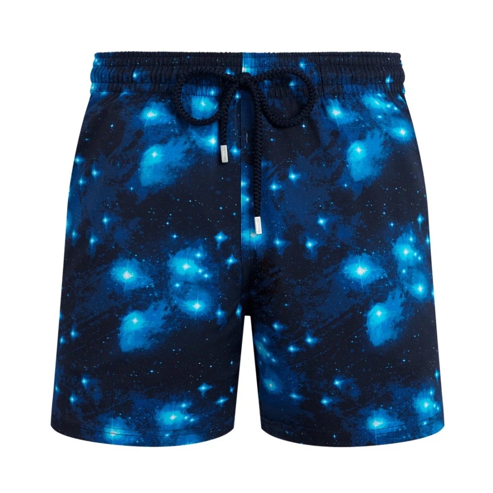 Blue stretch swim shorts featuring a vibrant galaxy print with shades of blue and black, an elastic waistband with drawstring, and a relaxed fit, size XXXL.