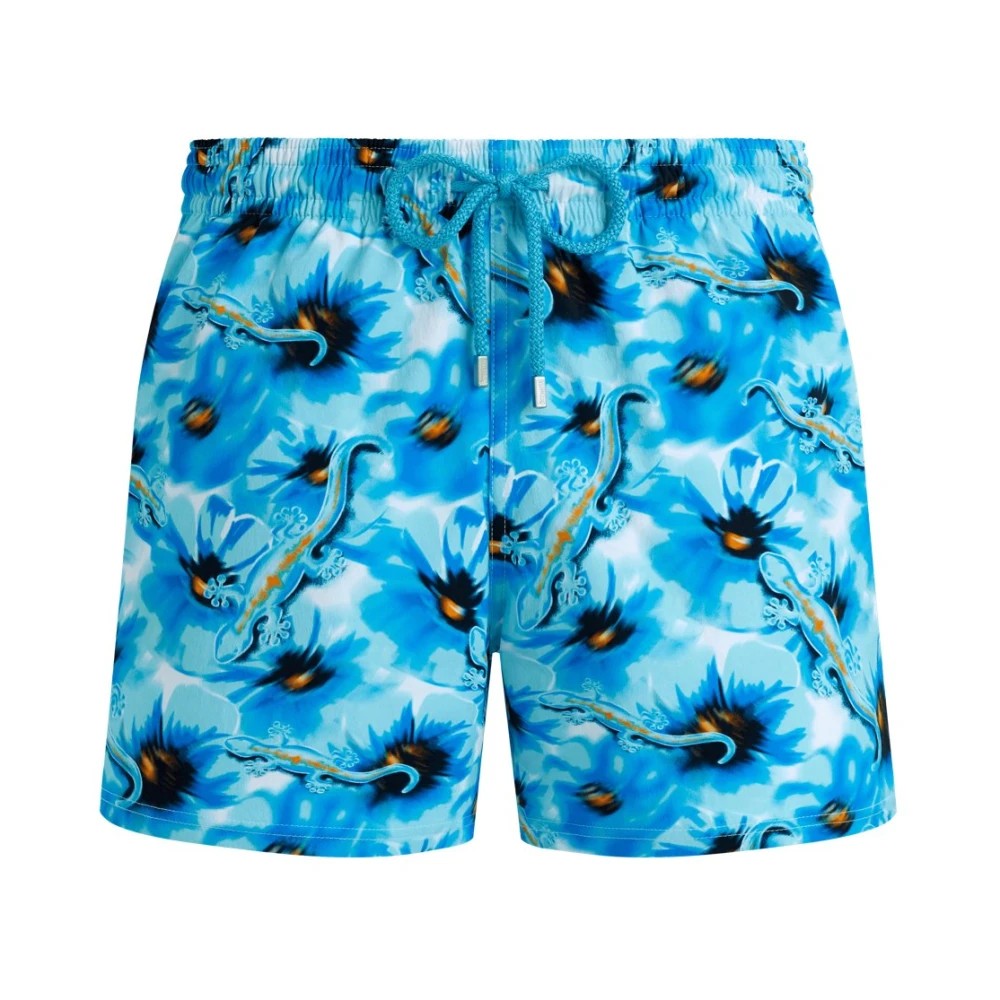 Blue stretch short swim shorts featuring a vibrant floral and gecko pattern, with an elastic waistband and drawstring for adjustable fit, size XL.