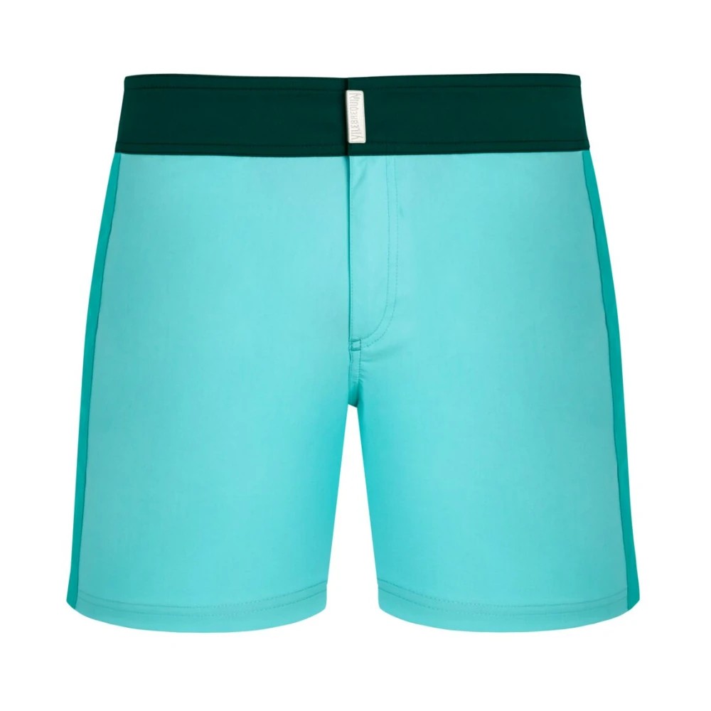 Men's Vilebrequin swim shorts in a vibrant blue color with a flat green belt, made from stretch material, featuring a color block design and size M.