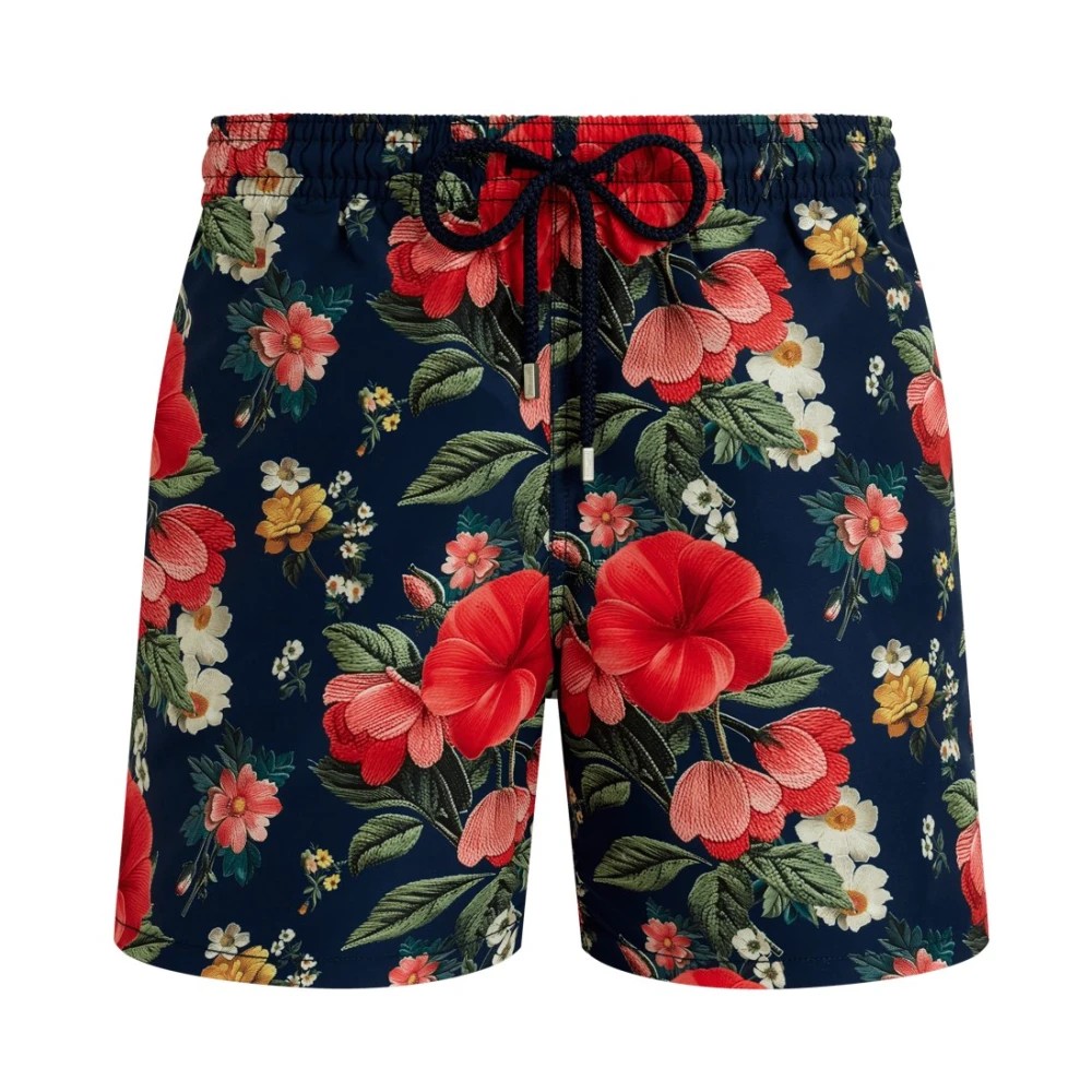 Navy swim shorts featuring a vibrant floral print with large red hibiscus flowers and smaller white and pink blooms, finished with a black drawstring waist.