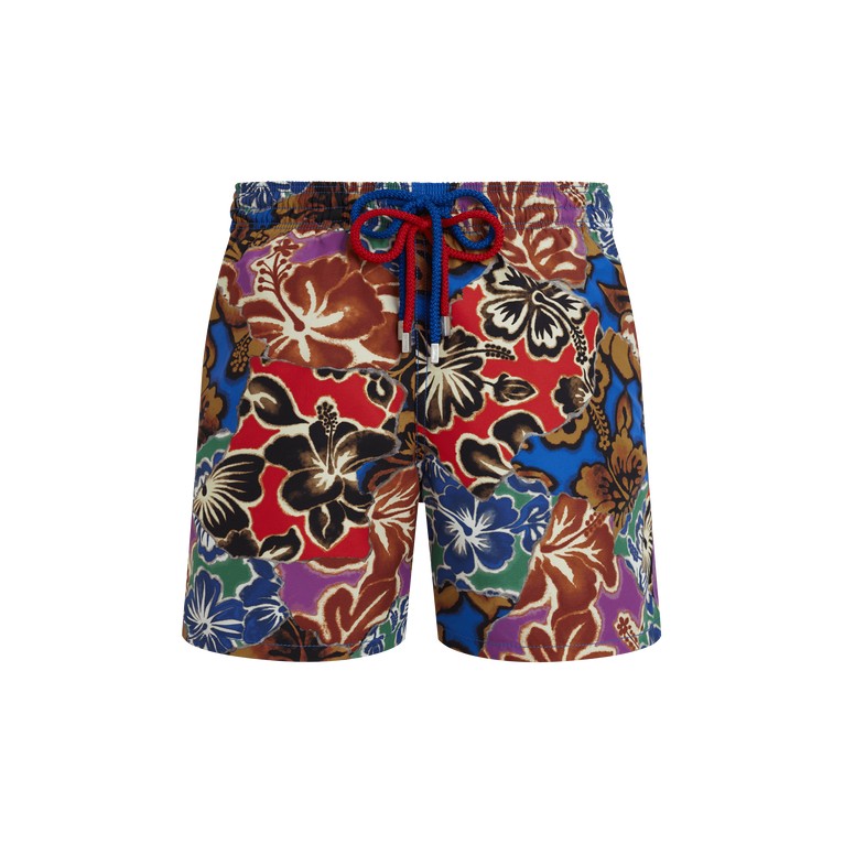 Blue swim shorts featuring a vibrant Hawaiian patchwork design with colorful floral patterns, elastic waistband, and contrasting drawstring, size M.