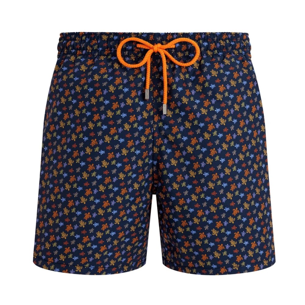 Navy swim shorts featuring a vibrant turtle print in orange and blue, with an elastic waistband and adjustable drawstring for a comfortable fit.