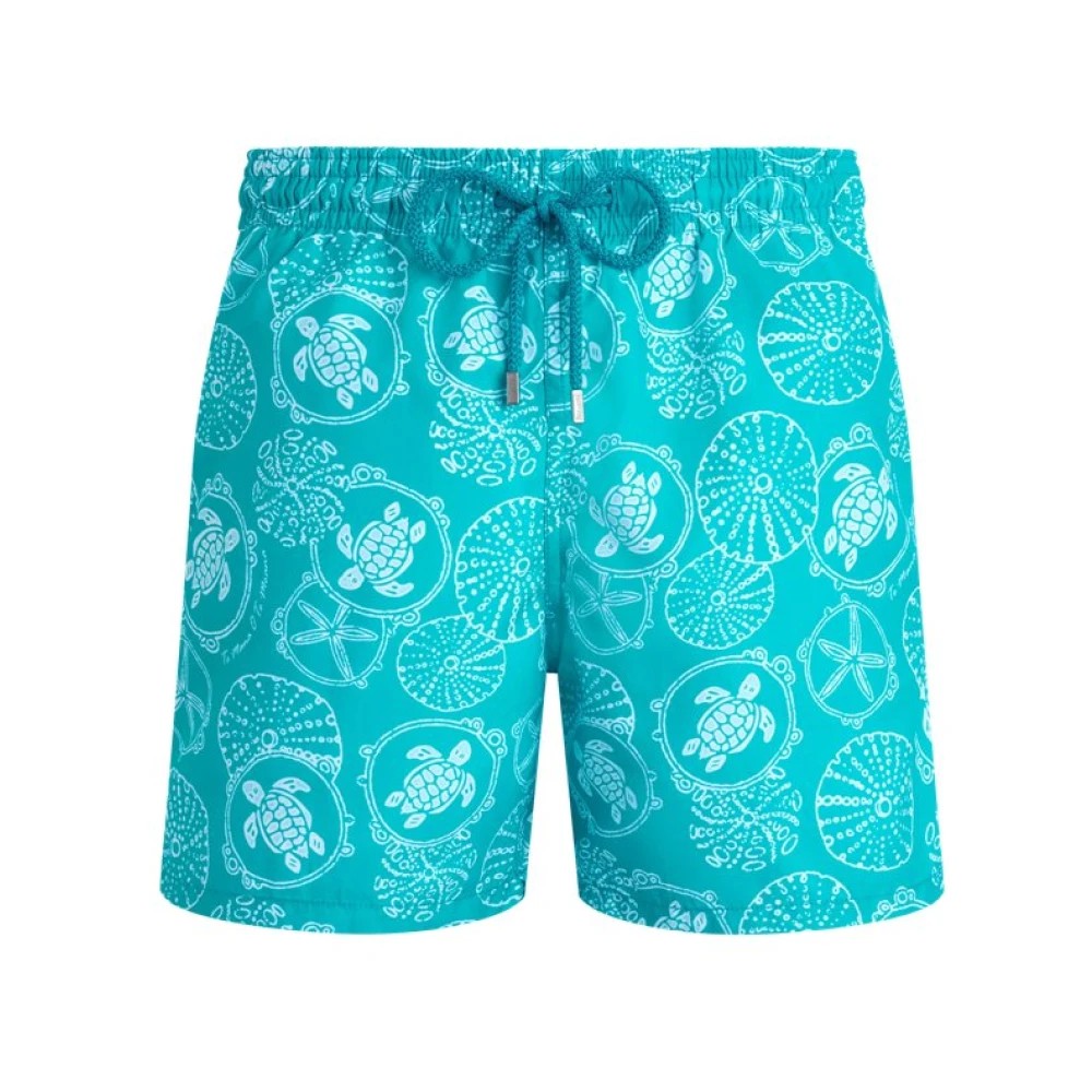 Turquoise swim shorts featuring a white turtle and sea-themed print, elastic waistband with drawstring, and made from quick-drying material, size L.