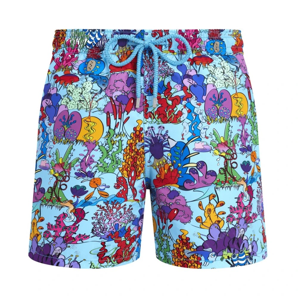 Bright blue swim shorts featuring a vibrant aquatic plant print in various colors, with an elastic waistband and drawstring for adjustable fit.