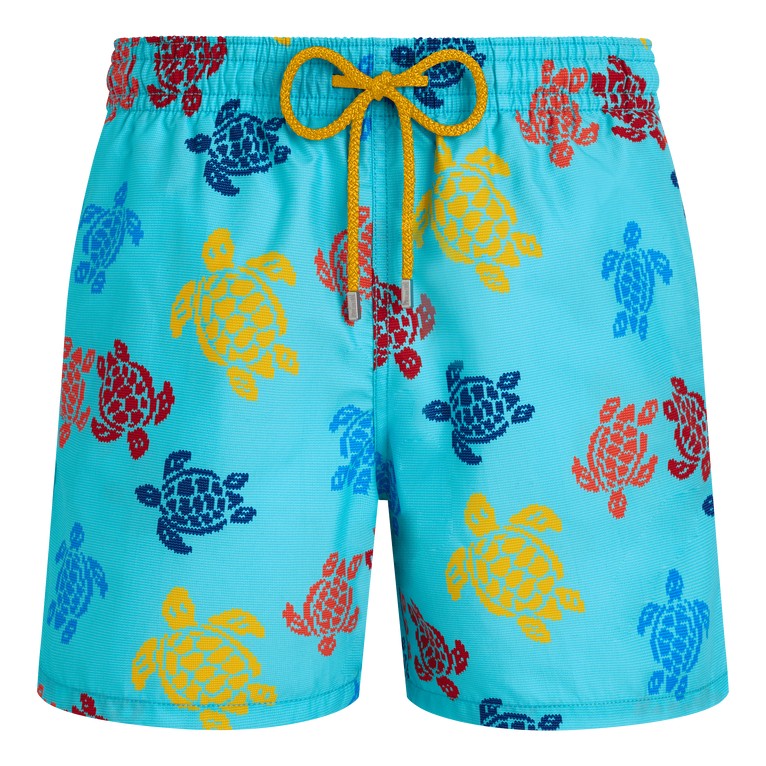 Blue swim shorts featuring a vibrant turtle print in red, yellow, and blue, with a yellow drawstring and a lightweight, quick-drying material, size XL.