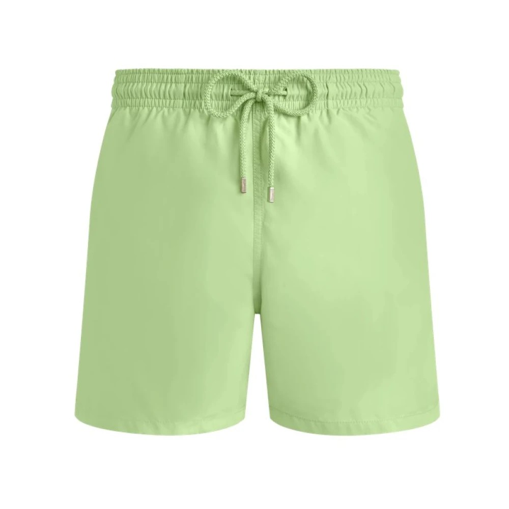 Solid green men's swim shorts by Vilebrequin, featuring an elastic waistband with a drawstring, made from lightweight material, designed for comfort and style.
