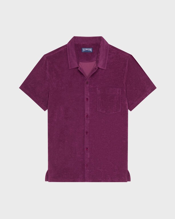 Short-sleeved bowling shirt in solid purple terry fabric, featuring a button-down front, a single chest pocket, and a relaxed fit, size M.