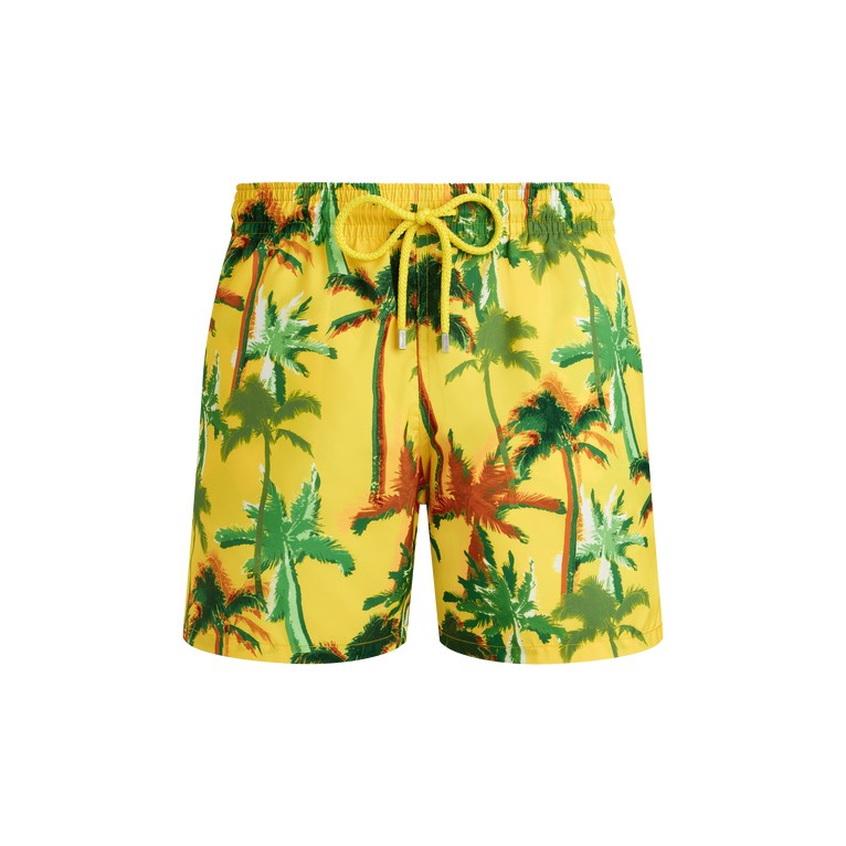 Bright yellow swim trunks featuring a vibrant palm tree print in green and red, made from ultralight, packable material with an elastic waistband and drawstring.