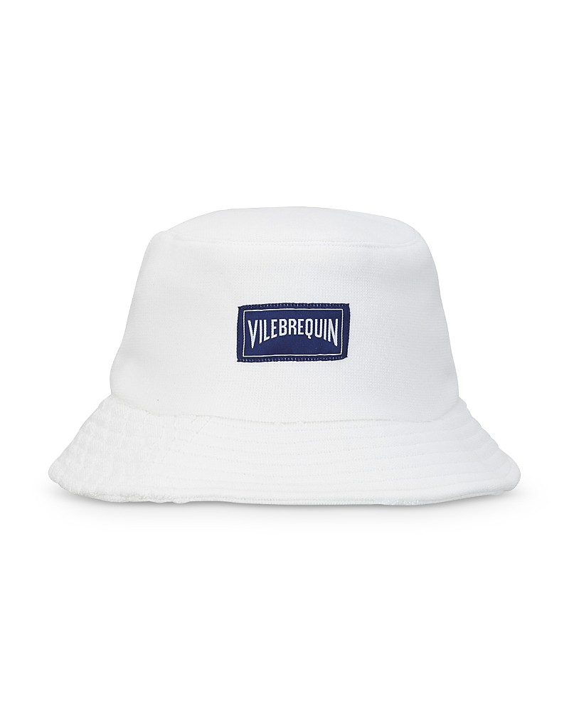 White terry bucket hat by Vilebrequin featuring a jacquard turtle pattern and a navy logo patch, designed in a Boheme style, available in size XS/S.