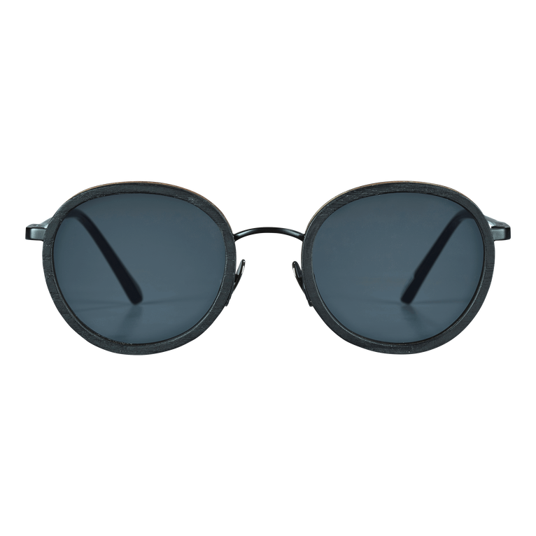 Round black sunglasses with dark lenses, featuring a unique tulipwood frame and sleek metal accents, designed for both men and women, labeled as Vilebrequin's Victoire model.