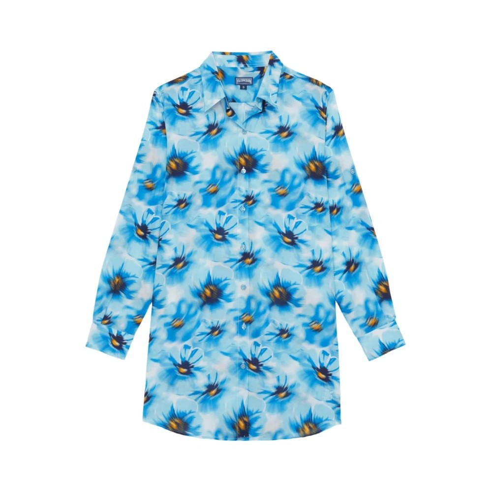 Light blue cotton voile shirt dress featuring a vibrant poppy floral print in shades of blue and orange, with a classic collar and long sleeves, size L.