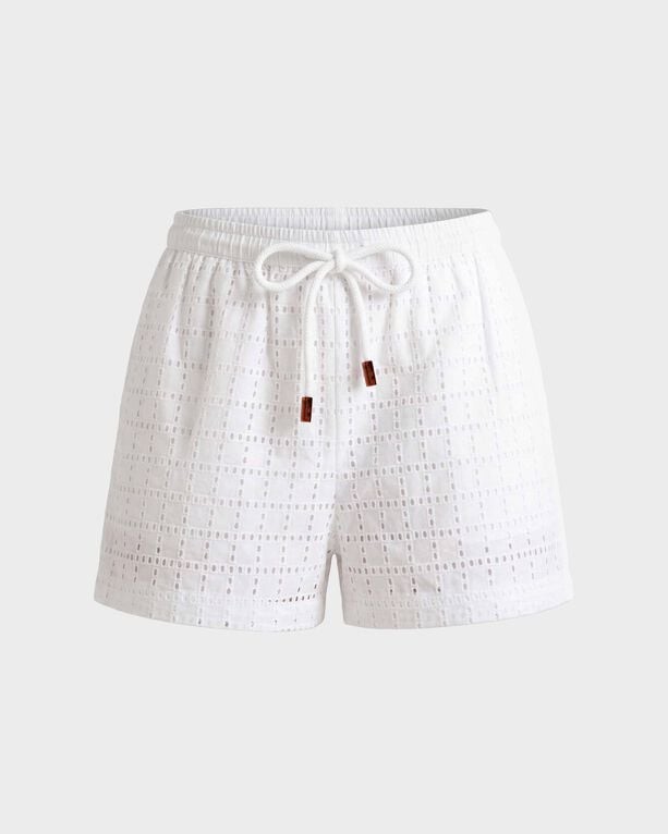 White geometric broderie anglaise shorts with a drawstring waist, featuring a relaxed fit and intricate cut-out patterns, labeled as size XS by Vilebrequin.