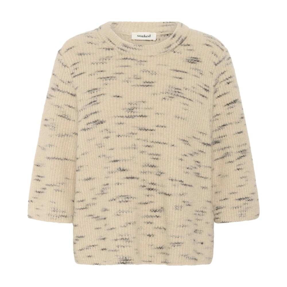 Beige sweater with a soft, textured knit featuring a subtle speckled pattern in darker tones, designed with a relaxed fit and three-quarter sleeves.