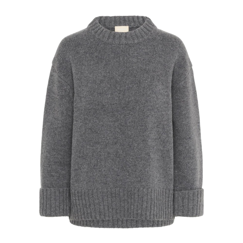 Cozy gray sweater with a high neck, oversized fit, and ribbed cuffs, made from soft material, featuring a minimalist design by Soaked in Luxury.