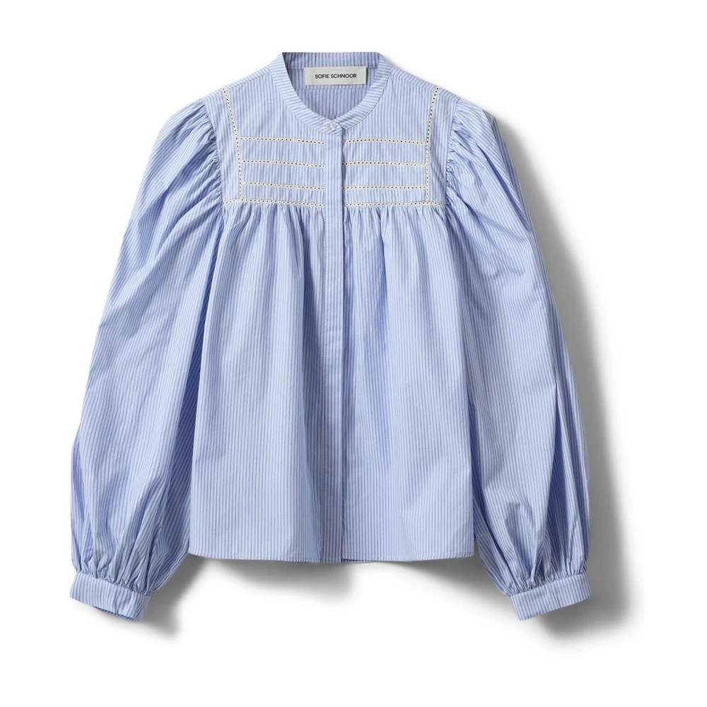 Light blue striped woman's shirt with a high collar, featuring puffed sleeves and decorative stitching on the yoke.