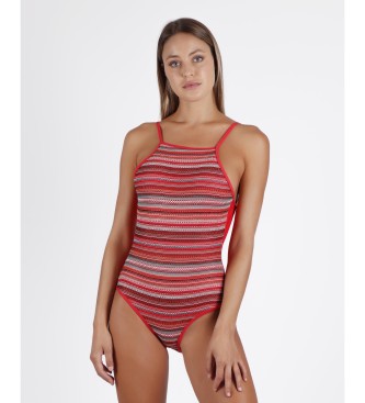 Red and multi-colored striped women's 1-piece swimsuit with thin straps and a high-cut leg, featuring a tribal-inspired design by Admas.