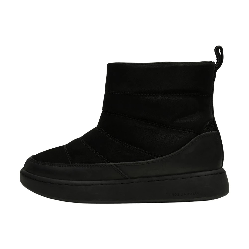 Black women's boots by Woden, featuring a sleek design with a soft upper, elastic panels, and a thick rubber sole for comfort and style.