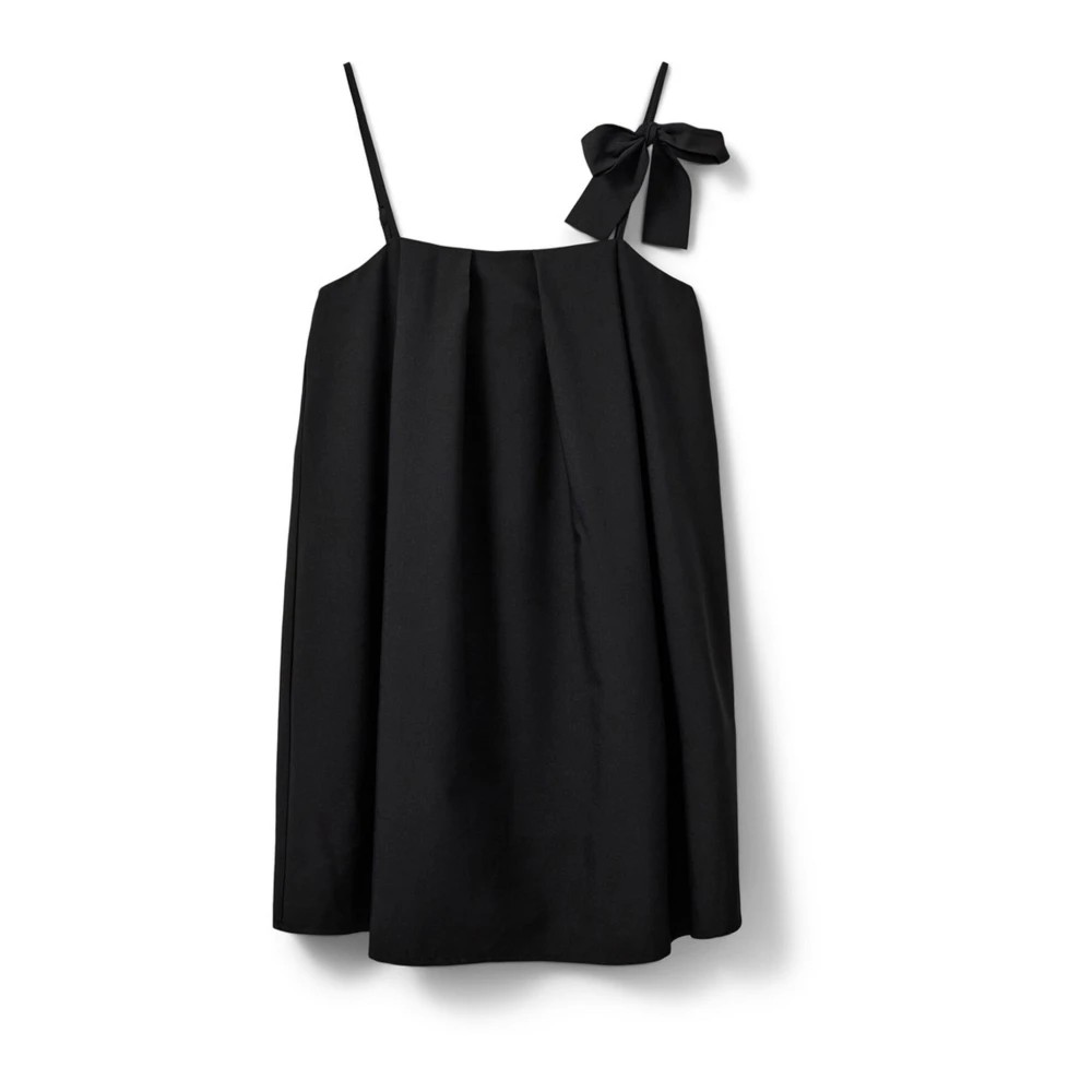 Black sleeveless women's dress by Sofie Schnoor featuring a loose fit, a bow detail on one shoulder, and a flowing silhouette made from lightweight fabric.