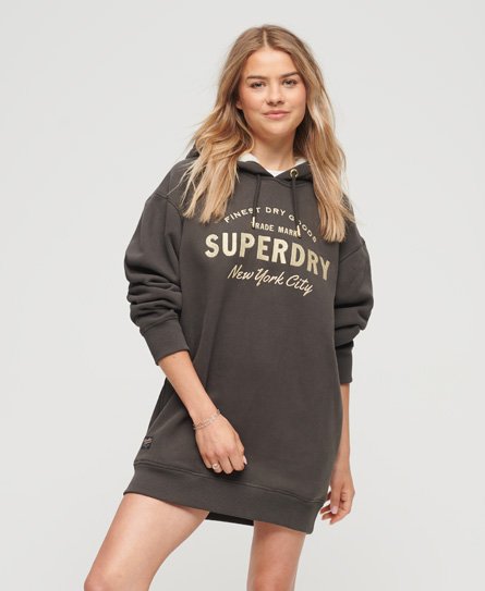 Luxe metallic women's dress by Superdry in a shimmering gold color, featuring a relaxed fit, short sleeves, and a stylish, casual design.