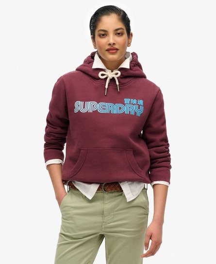 Burgundy hooded sweatshirt with a front pocket, featuring a blue Superdry logo and drawstring hood, made from soft material.