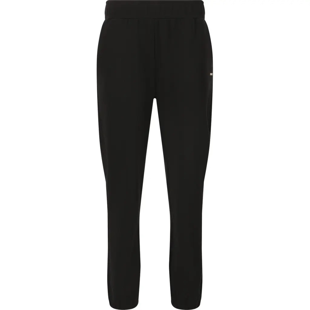 Black women's joggers by Athlecia, featuring a comfortable elastic waistband, tapered legs, and side pockets, made from soft, breathable material for active wear.