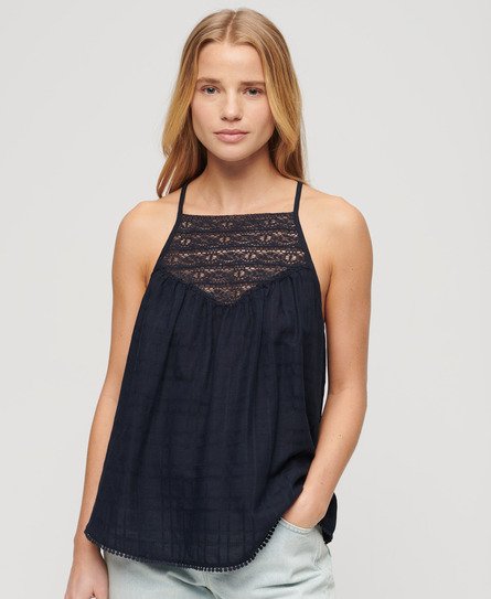 Navy blue women's lace tank top featuring a delicate lace panel at the neckline, adjustable straps, and a relaxed fit, perfect for beachwear.