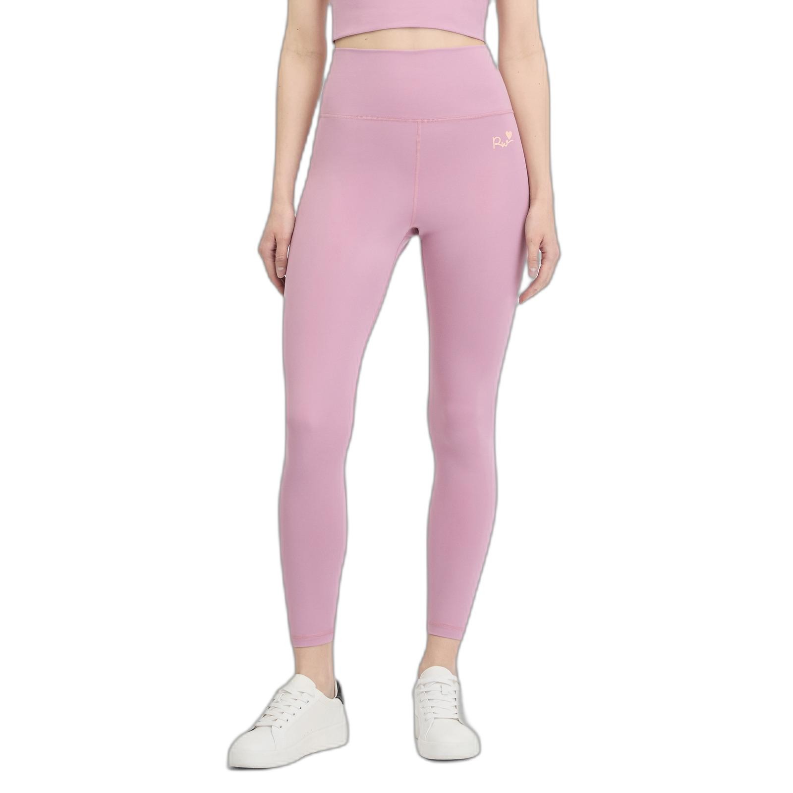 Light pink women's leggings by Ragwear, featuring a high waistband and a smooth, stretchy material, paired with a cropped top and white sneakers.
