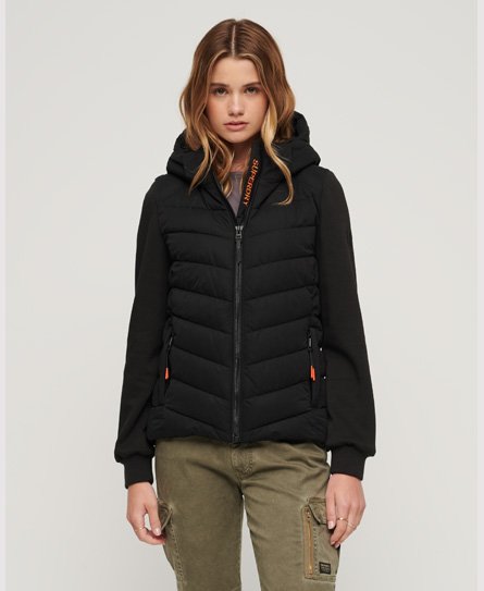 Black hooded hybrid padded jacket featuring a zip front, chevron quilted design, and orange detailing, designed for women in sizes 8 and 12.