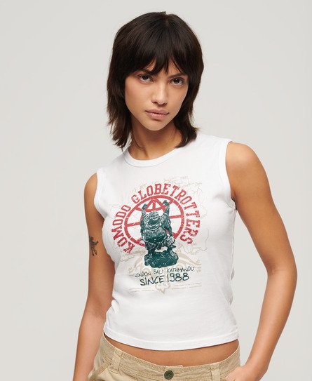 White sleeveless tank top featuring a graphic print of a bear and the text "Komodo Globetrotters" in red, made from soft cotton material.