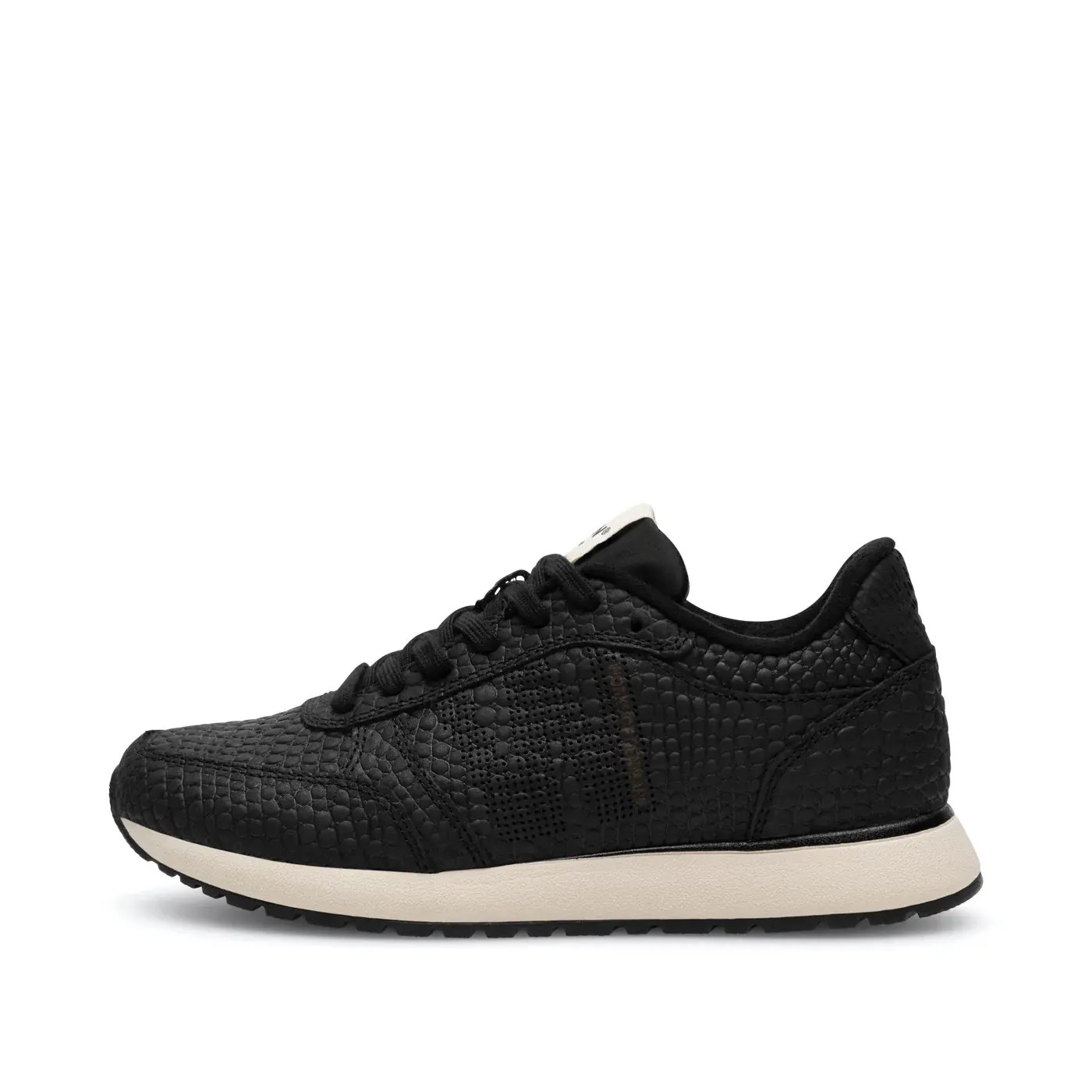 Black textured trainers with cowhair material, featuring a lace-up design, cushioned sole, and a contrasting beige midsole for a stylish look.