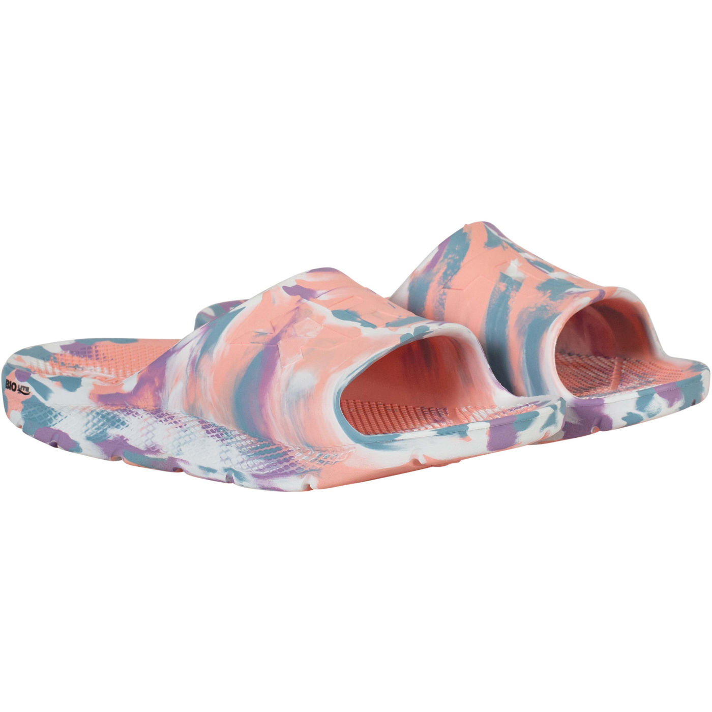 Women's Xtratuf Apres Fish Sandals in tie-dye pattern featuring shades of pink, purple, and blue, made of durable material with a slip-on design and textured footbed.