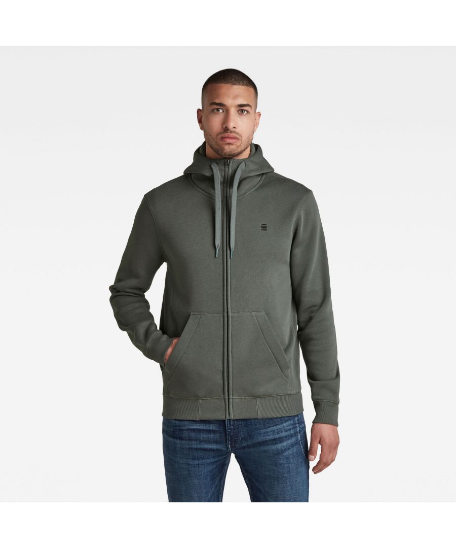 Dark green zip-up hoodie made of soft material, featuring a front zipper, adjustable drawstring hood, and a subtle G-Star logo on the chest.
