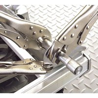 Silver Draper 3 piece curved jaw self grip pliers set on textured metal surface, gripping a metal rod.