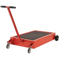 Red Sealey low level oil drainer with 64L capacity, black grated surface, and four wheels, including a handle for maneuvering.