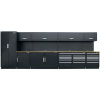 Black Sealey modular workshop storage with oak worktop, tall cabinet, overhead units, and drawers with silver handles.