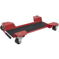 Red Sealey motorcycle dolly with black rubber platform and four swivel casters.