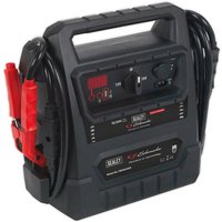 Black Sealey jump starter with handle, red clamps, LED display, and 12V/24V switch.