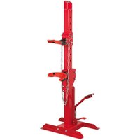 Red Sealey hydraulic coil spring compressor with gauge, vertical design, sturdy base, and adjustable clamps.
