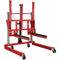 Red Sealey W508T wheel removal trolley with adjustable width, four caster wheels, and chain support system.