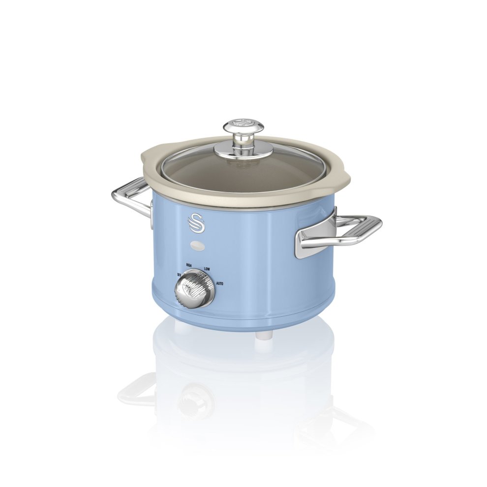 Light blue retro-style 1.5L slow cooker with a cream-colored lid, chrome handles, and a dial for temperature control, featuring a sleek, glossy finish.