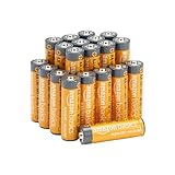 Pack of Amazon Basics AA alkaline batteries, orange with gray tops, arranged in a pyramid shape.